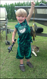 Kid with fish 